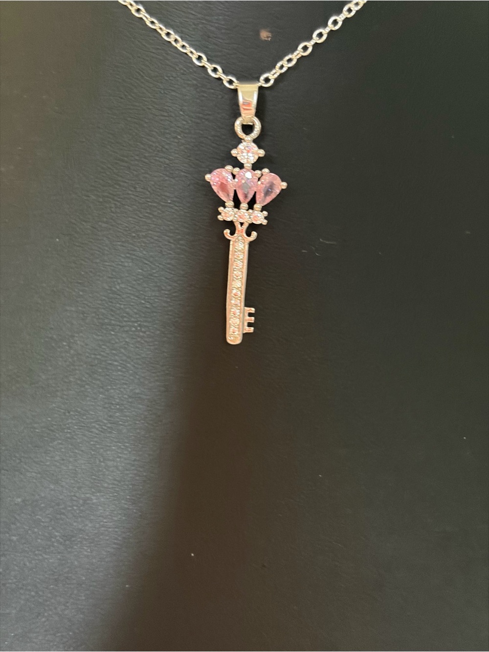 Silver  Key Pendant Necklace with Pink Crystal Crown Accent